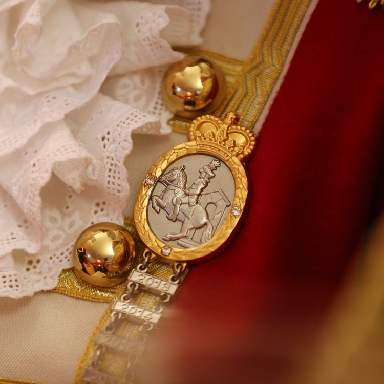 Foto eines Treuemedaillons Foto eines Treuemedaillons welches einen Reiter vor dem Wachhäuschen darstellt